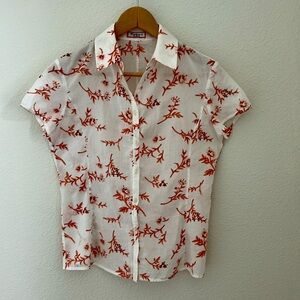 FarinaZ short-sleeve tailored blouse.